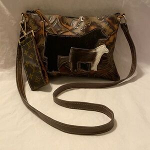 Crossbody tooled leather bag with HOH Brown Cows. Merricks wristlet keychain.
